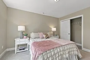 Carpeted secondary bedroom at Luna Ridge in Lenoir City, TN