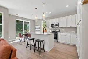 Open-concept kitchen and living room at Luna Ridge in Lenoir City, TN