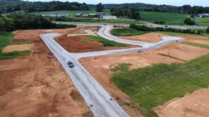 Newly paved streets and graded home sites under construction at Cara Villa, Lenoir City, TN